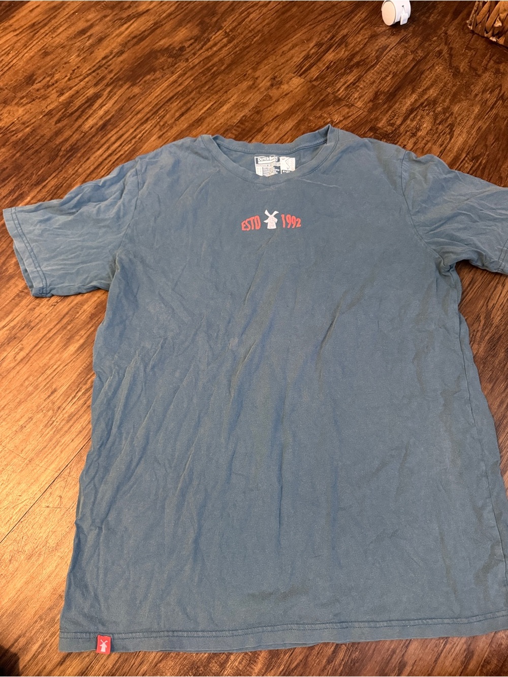 Dutch Bros Men's Short-Sleeve Tee in Faded Blue with Pink Graphic